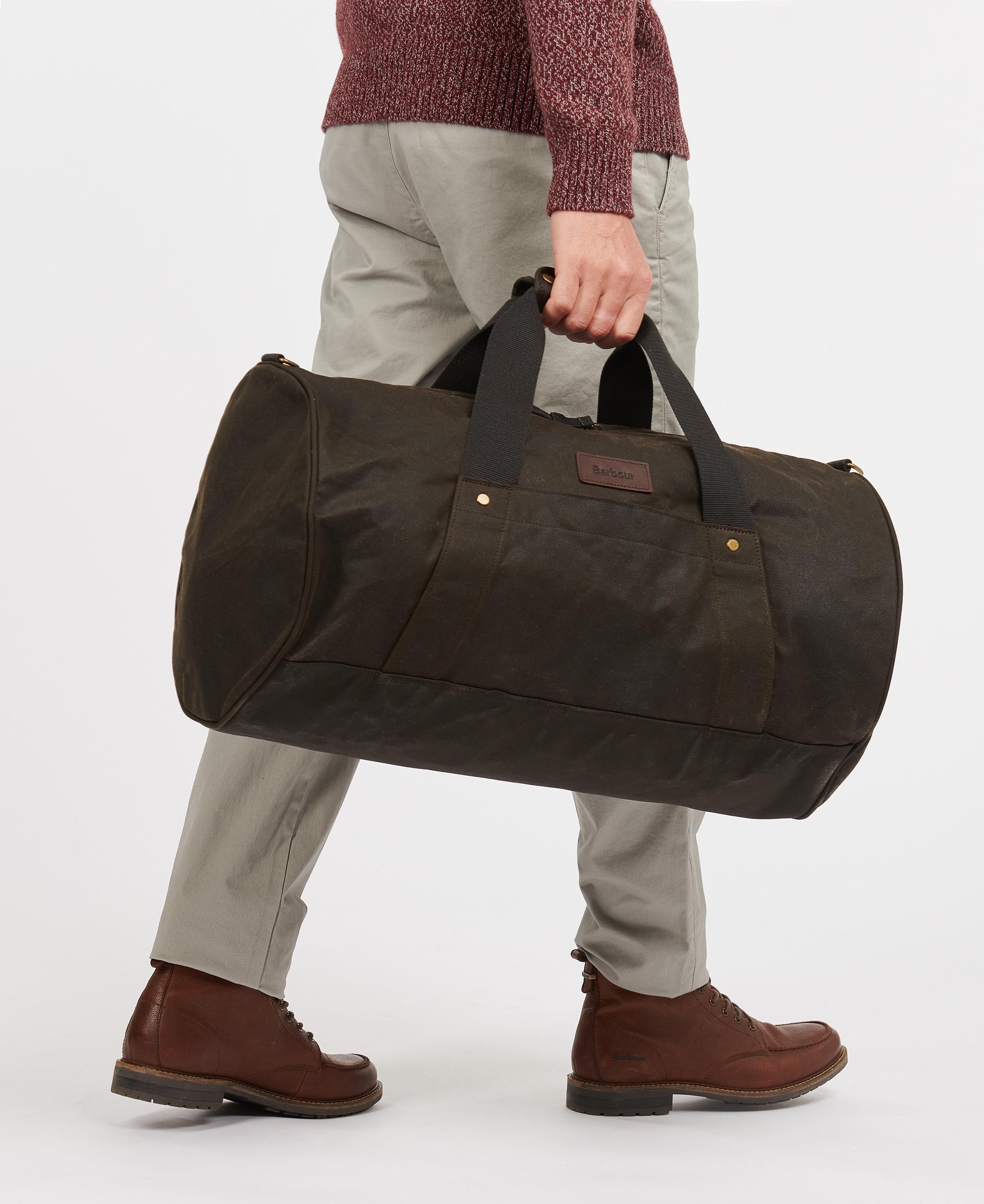Shop the Barbour Explorer Wax Duffle Bag in Olive